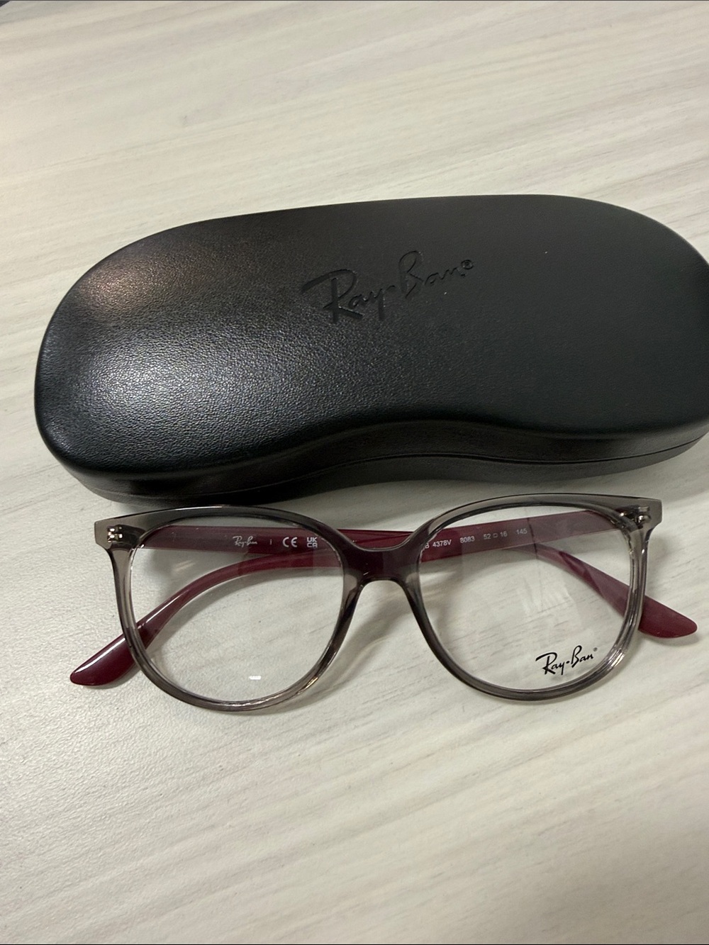 Ray-Ban rb4378V Translucent Gray Frame with Burgundy Temples Glasses - Picture 1 of 5